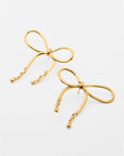 aretes con forma de moño con detalles derretidos, hecho a mano, coquette, marca mexicana, aleación de latón, baño de oro, arte, aretes grandes, aretes no pesados, summer sale, hot sale, regalo de cumpleaños para mujer, regalo de aniversario para mujer, descuentos, 25% de descuento, meses sin intereses.